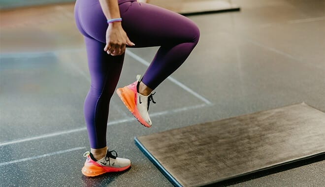 Woman warming up in class